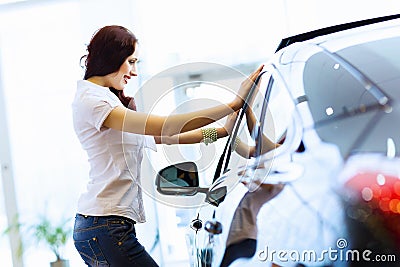 Young lady at car salon