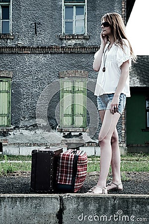 Young lady on an old railway station