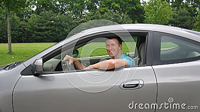 Young Man Driving Sports Car