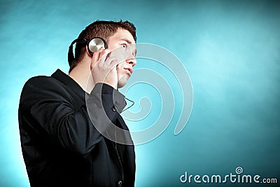 Young man with headphones listening to music