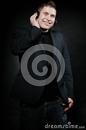 Young man with headphones listening to music