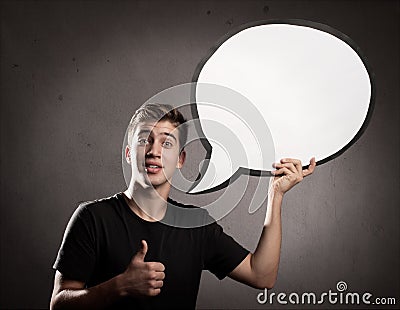 Young man holding a speech bubble