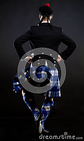 The young man in a kilt