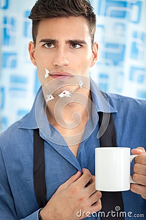 Young man looking his injury face in mirror