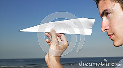 Young Man with Paper Airplane