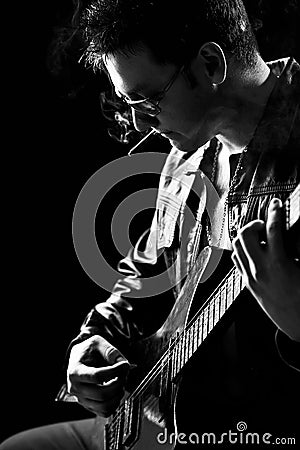 Young man playing the guitar