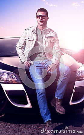Young man portrait and car