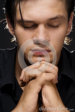 Young man praying