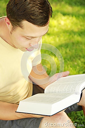 Young man reading the Bible