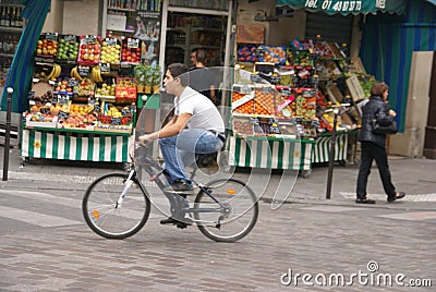 Young man rides his bike