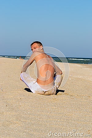 A young man by the sea