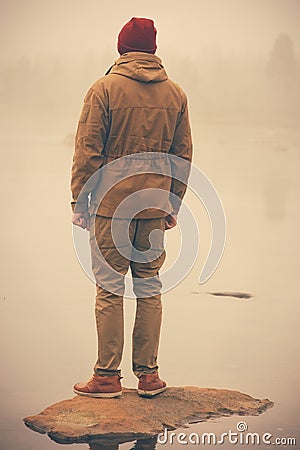 Young Man standing alone outdoor