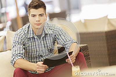 Young man with tablet