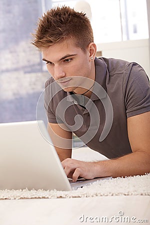 Young man using laptop computer