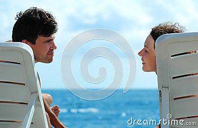 Young man and woman on beach