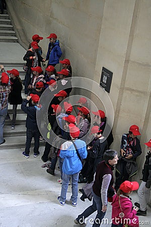 Young people visiting the Louvre in Paris