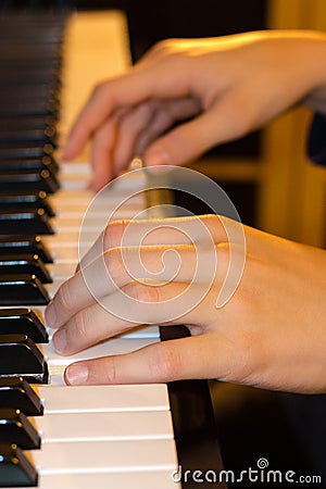 Young piano player s hands