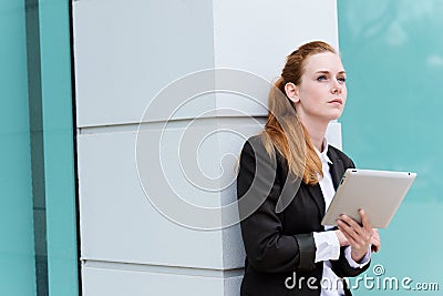 Young Redhead Businesswoman With Tablet PC