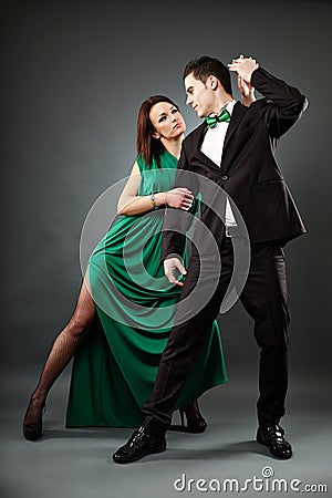 Young romantic couple dancing tango