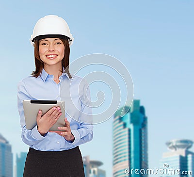 Young smiling businesswoman in white helmet