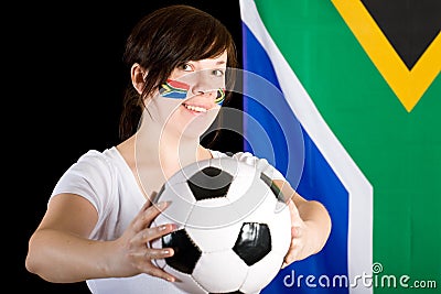 Young south africa supporter holds football ball