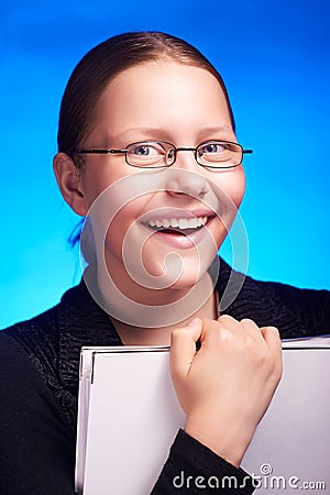 Young student in eyeglasses holds folder and smiling