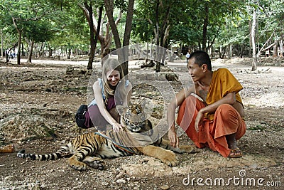 Young tourist girl in The Tiger Temple