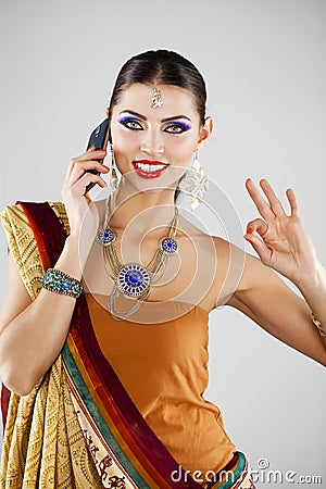 Young traditional Asian Indian woman in indian sari