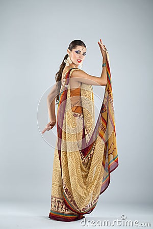 Young traditional Asian Indian woman in indian sari