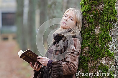 Young woman with a Bible