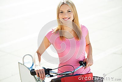 Young woman with bike