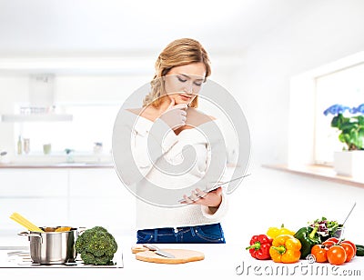 Young woman cooking in a modern kitchen