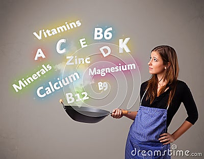 Young woman cooking vitamins and minerals