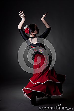 Young woman dancing flamenco