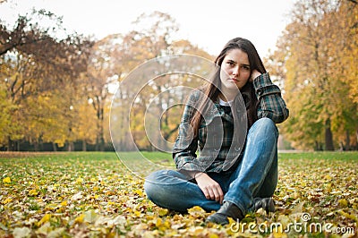 Young woman in depression outdoor