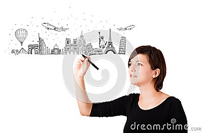 Young woman drawing landmarks on whiteboard