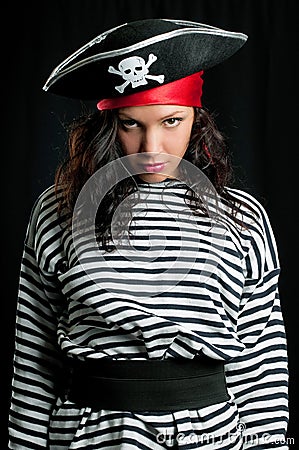 Young woman dressed as a pirate in a black hat