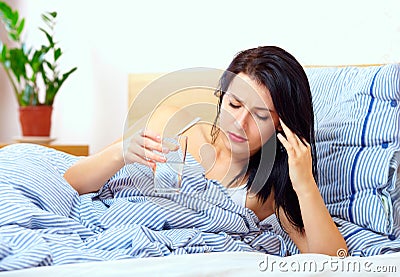 Young woman feel sick in the morning, headache
