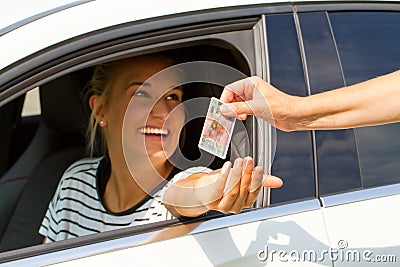 Young woman getting her driver license
