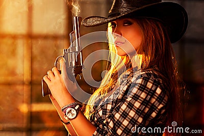 Young woman with gun