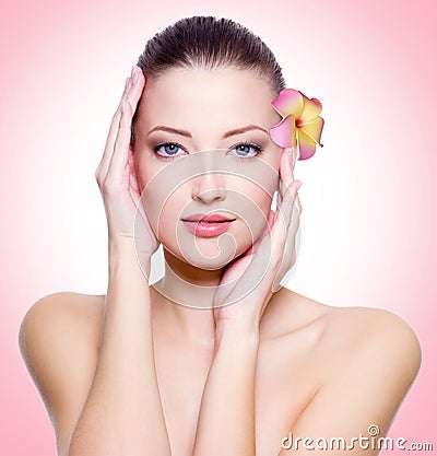Young woman with healthy clean skin of face