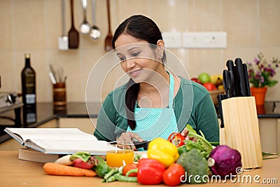 Young woman in her kitchen