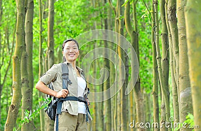 Young woman hiker in tropical jungle