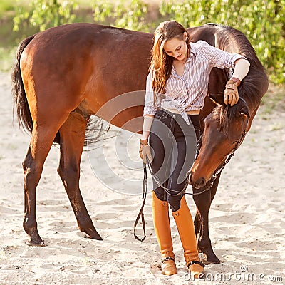 Young woman with a horse