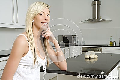 Young woman in kitchen setting