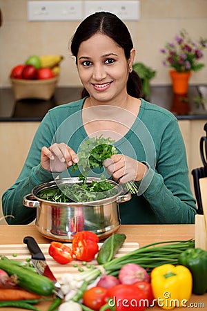 Young woman in kitchen