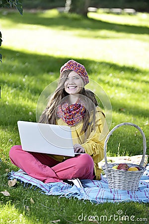 Young woman with the laptop