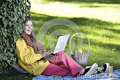 Young woman with the laptop