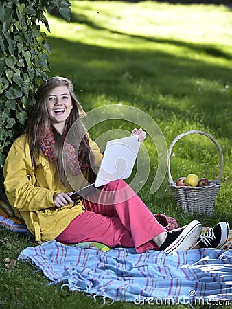 Young woman with the laptop