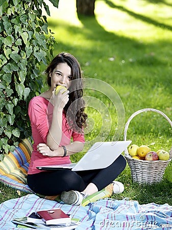 Young woman with the laptop